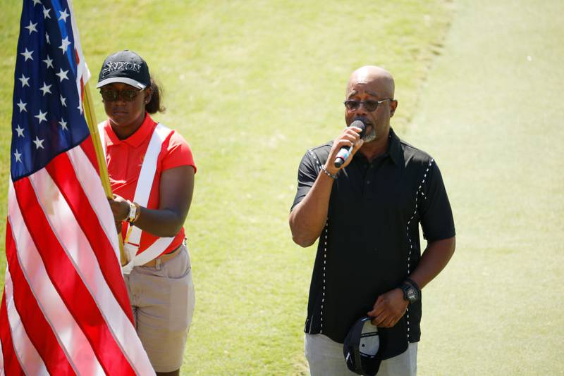 CHARLOTTE, NORTH CAROLINA - SEPTEMBER 22: Singer Darius Rucker performs the National Anthem on the first tee during the Thursday foursome matches on day one of the 2022 Presidents Cup at Quail Hollow Country Club on September 22, 2022 in Charlotte, North Carolina. (Photo by Jared C. Tilton/Getty Images)