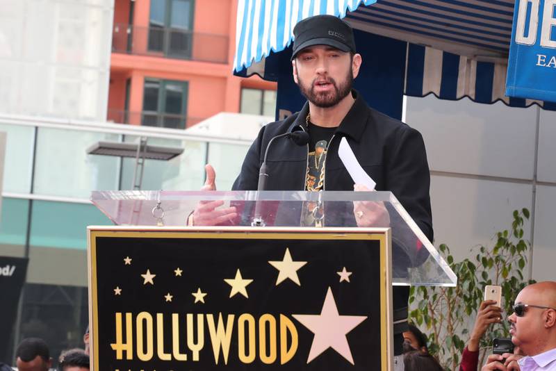 HOLLYWOOD, CALIFORNIA - JANUARY 30: Eminem speaks during a ceremony honoring 50 Cent with a star on the Hollywood Walk of Fame on January 30, 2020 in Hollywood, California. (Photo by Leon Bennett/Getty Images)