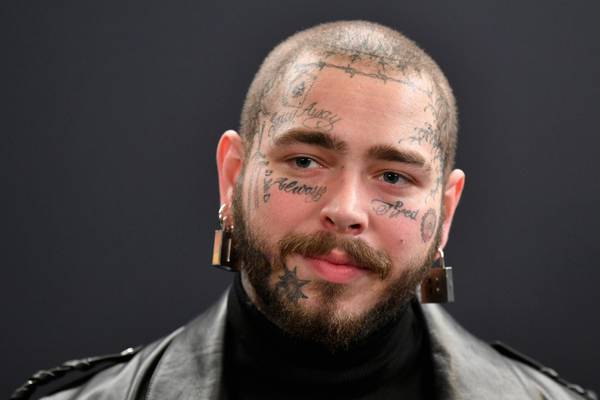Post Malone bruises ribs in on-stage fall during St. Louis concert